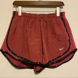 Dark Red Nike Shorts with black and white trim